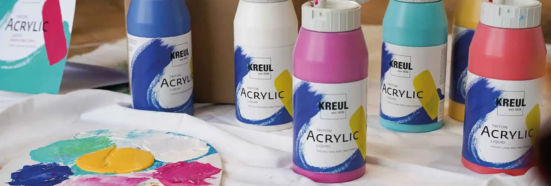 Kreul Triton acrylic colors in 750ml bottles.